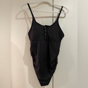 Summer Mae black maternity ribbed one piece swimsuit with button detail.
